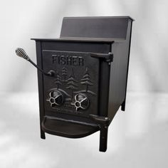 an old fashioned stove with the word fisher on it's front and side panels