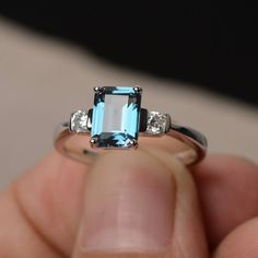 London Blue Topaz Ring Engagement Ring Emerald Cut Blue | Etsy Sterling Silver Topaz Baguette Cut Ring Gift, Baguette Cut Sterling Silver Topaz Ring For Gift, Blue Emerald Cut Ring, Birthstone, Blue Emerald Cut Ring For Birthstone, Sterling Silver Radiant Cut Topaz Ring, Fine Jewelry Radiant Cut Topaz Ring In Sterling Silver, Blue Emerald-cut Ring With Birthstone, Fine Jewelry Topaz Ring In Sterling Silver, Radiant Cut, Radiant Cut Topaz Ring In Sterling Silver