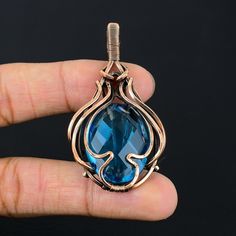 Handmade Copper Chain Size 18-20Inch - https://www.etsy.com/in-en/listing/1162990726 Welcome to our little shop, where you can find handmade copper wire jewelry and more, for you and your loved ones. We do accept custom orders also, kindly message us for more. Blue Topaz Pendant Copper Wire Wrapped Pendant Blue Topaz Gemstone Pendant Handmade Pendant Necklace Christmas Gift Blue Topaz Jewelry Gemstone : Blue Topaz  Pendant length : 6 Cm Metal : Copper  * Protection:- Copper will be tarnished after a while so try to limit contact with lotions, soaps or anything moist and never wear it in the shower, swimming or anywhere else it may come in contact with water. If tarnish becomes an issue, you may clean this item with jewelry cleaning cloth or ultra polishing pads. * Packing:- Your jewelry ar Handmade Blue Topaz Blue Jewelry, Handmade Blue Topaz Jewelry, Handmade Sapphire Crystal Necklaces As Gift, Handmade Sapphire Crystal Necklace Gift, Handmade Sapphire Crystal Necklace For Gift, Handmade Aquamarine Pendant Jewelry, Blue Gemstone Copper Jewelry, Blue Gemstone Jewelry In Copper, Handmade Blue Topaz Pendant Jewelry