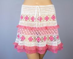 This exclusive skirt is made in a single copy. This unique pink white crochet skirt with flowers is the perfect piece of summer beach clothing. Size: S(6) - M(8) (See the Sizing Guid). Length of the skirt: 15 inches (38 cm). This lace skirt is made up of thin yarn 100% Mercerized Cotton.  Cleaning: hand wash in cool water. Squeeze in a towel to remove excess water and lay flat to dry. I offer you an amazing experience with wonderful design of items with high quality, fast shipping and excellent White Crochet Skirt, Skirt With Flowers, Cotton Mini Skirt, Beach Clothing, Crochet Skirts, Birthday Gift For Women, Women Birthday, Crochet Skirt, Christmas Gifts For Women