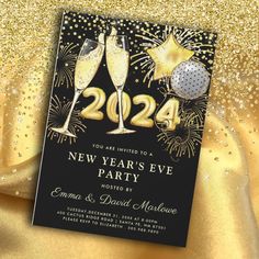 new year's eve party card with two champagne glasses and fireworks in the background