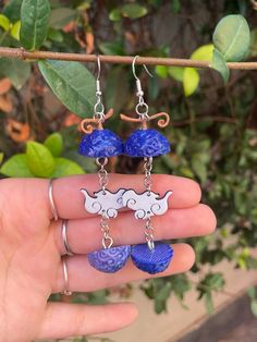 One Piece Theme Drop Earrings - Gomu Gomu no Mi Fruit - Devil Fruit / Sea Fruit, Inspired by Joyboy. Cosplay Jewelry. These earrings are perfect to add to your one piece themed collection.🍇 ✅They are handcrafted from UV epoxy resin on the outside and 3d printed PLA on the inside. Our products are 100% safe and non-toxic. The hooks are made (not by us) from silver plated metal. ✅They are all unique customizable pieces so any differences from the photos are due to the manual invoice. 🟢The pendan Gomu Gomu No Mi Fruit, One Piece Theme, Devil Fruit, Fruit Fruit, Cosplay Jewelry, Epoxy Resin, 3d Printed, Jewelry Earrings Dangle, Silver Plated