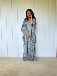 Unwind in absolute comfort with our semi sheer cotton gauze kaftan. This kaftan is perfect for the beach, pool, resort and laid-back time at home. Crafted from quality soft and breathable gauze cotton, it offers an airy fit that's ideal for lounging and cover up. Its relaxed design and easy slip-on style make it your go-to choice for outdoor cover up and relaxed nights at home. Summer Vacation Maxi Dress With Natural Dye, Bohemian Oversized Cover-up For Poolside, Long Relaxed Fit Beachwear Cover-up, Flowy V-neck Kaftan For Poolside, Bohemian Unlined Kaftan For Beach Cover-up, Flowy Summer Kaftan For Loungewear, Bohemian Kaftan For Beach Cover-up, Oversized Casual Kaftan For Beach Cover-up, Relaxed Fit Tunic Beach Dress Cover-up