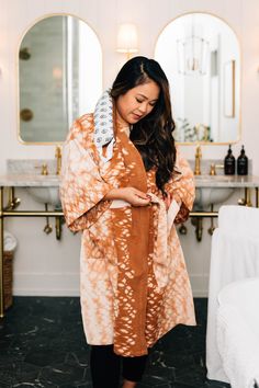 Transform your shower or bath into a spa-like experience. Wrap yourself in this entirely handcrafted kimono-style robe. Using a recipe of all-natural ingredients, this 100% cotton robe is hand loomed, then hand-dyed. Feel the care and artistry shine through, elevating an everyday moment. Crafted by artisans with Manushi, meaning "energetic woman" in Nepali. Chain Scarf, Candle Wall Decor, Everyday Moments, Accessories Bags Purses, Scarf Hat, Hand Loom, Kimono Fashion, Winter Wear, Corporate Gifts