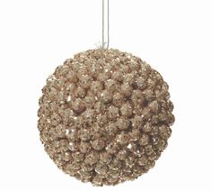 a ball ornament hanging from a string