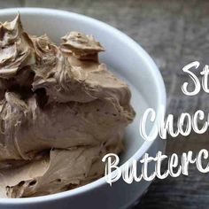 a white bowl filled with chocolate butter on top of a table