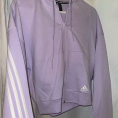 Never Worn! Sporty Purple Sweatshirt For Spring, Spring Adidas Sweatshirt For Sports, Adidas Spring Sweatshirt With Drawstring Hood, Adidas Sweatshirt With Drawstring Hood For Spring, Adidas Spring Sweatshirt For Sports, Adidas Spring Sports Sweatshirt, Adidas Cotton Hoodie For Spring, Adidas Casual Hoodie For Spring, Purple Zip Up Hoodie