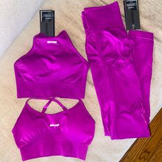 New With Tags And Box: Bo+Tee Beautiful Durable Purple Fitness Bra Leggings Set. 1 Xs Sports Bras (Circuit) + 1 Xs Highneck Sports Bra (Incline) + 1 Medium Seamless Legging (Superset). Exclusive Discontinued Collection From Uk Fitness Apparel Retailer Bo And Tee. Great Quality Fabrics, Super Stretchy, Very Supportive Not See Through, Flattering Compression And Support. Selling Sets In Other Colors, Discount If Purchases Together. Ship Same Day If Purchased By 12pm Est. Seamless High Stretch Sportswear Sets, Seamless Workout Sets In Athleisure Style, Seamless Sportswear Sets For Workout, Casual Seamless Sports Sets, Sporty Stretch Seamless Sets, Athleisure Sports Sets With Seamless Design, Athleisure Sports Set With Seamless Design, Seamless Yoga Sets In Athleisure Style, Sporty Seamless Stretch Sets