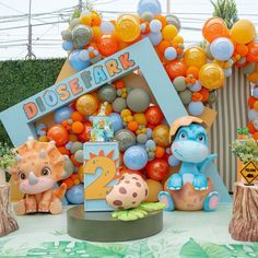 an animal themed birthday party with balloons and decorations