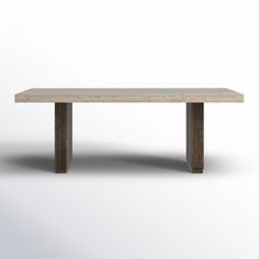 a wooden table sitting on top of a white floor