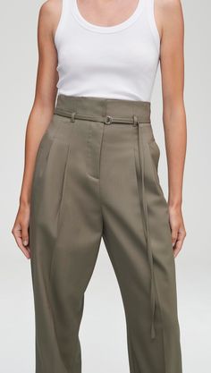 Made of a year-round, refined Italian stretch wool, this high-waisted trouser features a straight tapered leg and removable belt. The lightweight fabric is naturally temperature regulating and odor and wrinkle resistant. Functional details include side slash pockets and back welt pockets. Pairs well with an elevated top or the Peak Lapel Blazer in Seasonless Wool. Womens Wool Pants, Belted Trousers, Womens Straight Leg Pants, Belt Pants, Lapel Blazer, Pants Details, Slim Trousers, Belted Pants, Peak Lapel