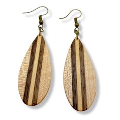 Our Inlay Wood Earrings are a beautiful and unique gift for the special people in your life. They feature a variety of wood, shaped to a teardrop shape, and finished with a touch of copper ear wires. Measuring at 3 inches with ear wires, these earrings are a perfect size and make a wonderful addition to any outfit. Give the gift of style and elegance with our Inlay Wood Earrings for any season! Natural Color Jewelry For Gifts With Pierced Ears, Natural Color Jewelry For Pierced Ears As A Gift, Natural Jewelry For Pierced Ears As A Gift, Oval Hypoallergenic Teardrop Earrings As Gift, Adjustable Brown Earrings For Gift, Hypoallergenic Oval Teardrop Earrings For Gifts, Adjustable Jewelry With Natural Variations As Gift, Nature-inspired Teardrop Earrings For Gifts, Natural Color Dangle Jewelry For Gifts