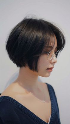 Top 21 Flattering Hairstyles for Round-Faced Women with Glasses | Lookosm Women Haircut Round Face, Short Haircuts With Bangs Round Face, Women Short Hair With Bangs, Short Hairstyle Women Asian Round Face, Short Bob Hairstyles Round Face, Short Haircuts With Glasses, Short Hair Styles Bangs, Short Ear Length Hair, Short Bob For Round Face