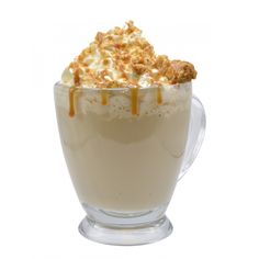 a glass cup filled with whipped cream and caramel drizzle