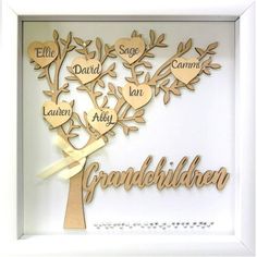 a wooden family tree with names and hearts