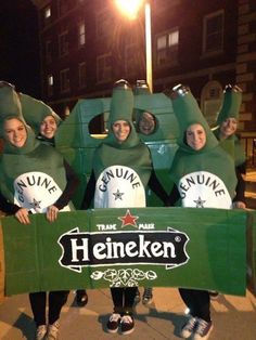 some people in costumes are holding a sign