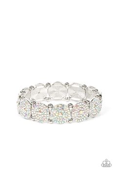 a white bracelet with multicolored stones on it