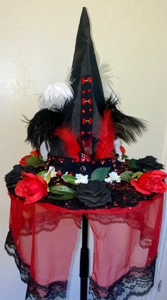 Beautiful one of a kind witch hat Jillian is classy in black red and white. Detailed in lace, sequin and rhinestones lots of gold red and black crystals. Silk rose flowers in black, white and red. Black and white ostrich feathers, has a red and black lace veil that goes all the way around.   Great for Halloween, cosplay, masquerade, wedding, bachelorette party, parade, witchcraft, Dance, just for fun.  Fits up to 24 inch Fun Fits, Halloween Witch Brooms, Masquerade Wedding, Lace Veil, Silk Rose, Lace Veils, Witch Costume, Fancy Hats, Costume Hats