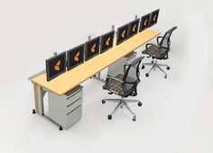 an office desk with four chairs and three monitors on the top, all displaying orange arrows