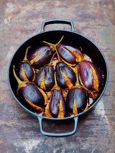 eggplant in a skillet on a table