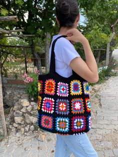 in stock! Granny square Afghan colorful bag is the perfect accessory for all your summer and winter outfits. Vivid colors of cotton are used in the crochet bag. It does not take up space in your closet, it is stylish and flashy. Bag Size Width 39 cm / 15,3 inches Height 38 cm / 14,9 inches Strap length 55 cm / 21,6 inches lined and pocketed washing information It can be washed in the hand wash program at 36F / 30C. You can lay it on a flat surface and dry it. Wish you have a good time in my shop Casual Square Crochet Bag For Daily Use, Black Rectangular Crochet Bag For Summer, Black Rectangular Crochet Summer Bag, Black Square Crochet Bag With Large Capacity, Large Capacity Black Square Crochet Bag, Colorful Casual Crochet Shoulder Bag, Casual Multicolor Square Shoulder Bag, Casual Multicolor Square Bag, Multicolor Crochet Bag For Shopping