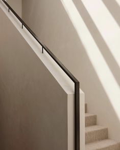 a stair case next to a set of stairs