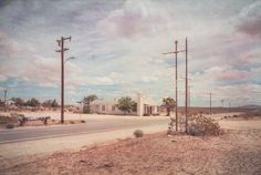 an empty street in the middle of nowhere