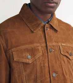 "Find RALPH LAUREN Suede Trucker Jacket on Editorialist. Touted as the brand that \"dressed the world in the American Dream\", Polo Ralph Lauren is responsible for many sartorial icons. A distinct piece of Americana is the trucker jacket, which is inspired by both workwear and Western codes. Here, the style is crafted from lush goat suede and that has been specially treated for additional dimension." Ralph Lauren Single Breasted Outerwear For Fall, Fitted Ralph Lauren Outerwear With Welt Pockets, Ralph Lauren Outerwear With Lapel Collar And Welt Pockets, Ralph Lauren Outerwear With Welt Pockets And Lapel Collar, Ralph Lauren Long Sleeve Outerwear With Welt Pockets, Ralph Lauren Spring Outerwear With Button Closure, Spring Ralph Lauren Outerwear With Button Closure, Fitted Ralph Lauren Outerwear With Pockets, Ralph Lauren Casual Brown Outerwear