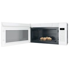 a white microwave oven with some food in it