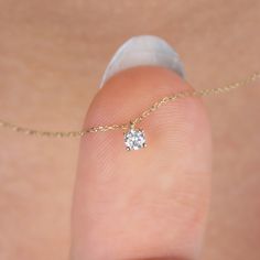 "Show that you value your loved one. Our tiny diamond necklace; It is suitable for daily use, a nice gift for your lover. Shine with this stylish and elegant solitaire necklace. April birthstone necklace 🤍🤍 Special gifts for your special moments. We produce our jewelery for you in the most perfect way. 🤍🤍 All of our products are carefully crafted from 14k Solid gold and Real diamonds. FEATURES * Made to order. * Gold Color Selection: Yellow Gold, Rose Gold, White Gold * Gold KT: 14K * Length Yellow Gold Diamond Solitaire Necklace With Birthstone, Minimalist 14k Gold Diamond Necklace With Prong Setting, Dainty Solitaire Necklace For Anniversary, Dainty Solitaire Round Cut Necklace, 14k Gold Minimalist Solitaire Necklace For Anniversary, Minimalist Diamond Solitaire Necklace With Birthstone, Fine Jewelry Diamond White Necklace With Birthstone, Dainty Everyday Solitaire Necklace With Prong Setting, Solitaire Necklace With Single Round Cut Diamond For Gift