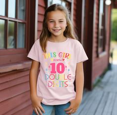 This Girl Is Now Ten Double Digits Shirt, 10th Birthday TShirt, Ten Years Old Girl Gift, Tenth Birthday Tee, 10th Birthday Girl Party Shirt ----- How To Order ----- 1-) Please, check and review all the photos. 2-) Choose your t-shirt size and color. *Different styles of shirts may have different shades of same color choice due to different manufacturer brands. *For this reason, we recommend you to match shirts from the same styles if you want precisely matching colors (ex. Unisex, V-necks, Toddl 10th Birthday Girl, Tenth Birthday, Birthday Tshirts, Birthday Tee, Matching Colors, Shirt Fits, Girl Party, 10th Birthday, Party Shirts