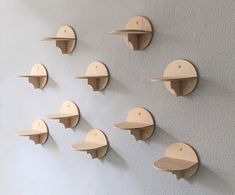 several wooden shelves mounted to the wall