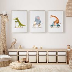 three children's art prints hang on the wall in a child's room