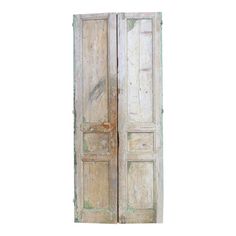 an old wooden door with peeling paint on the doors and side panels, isolated against a white background