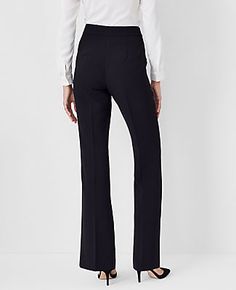 Elevate your wardrobe with the Ann Taylor Side Zip Trouser Pant, meticulously crafted to enhance your silhouette with a touch of elegance. These pants feature a discreet side zip with a hook-and-eye closure that ensures a seamless look, perfect for a polished office outfit or a sophisticated evening ensemble.

- **Size:** 0 Regular
- **Color:** Black
- **Material:** 95% Polyester, 5% Spandex
- **Fit:** Tailored and fitted
- **Rise:** High rise, sits 1/2" to 1" below natural waist
- **Leg Shape:* Knitted Suit, Zip Dress, Trouser Pants Women, Trouser Style, Tall Women, Office Outfits, Trouser Pants, Evening Wear, Effortless Style