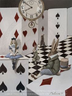 a clock is on the wall next to some playing cards and rabbit figurines