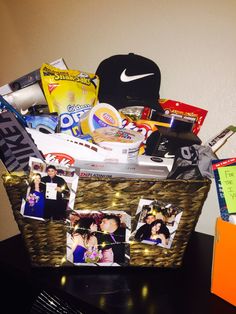 a basket filled with photos and other items