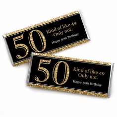 two black and gold birthday candy bar wrappers with the number forty on each one