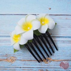 Always designed in Hawaii at Lavahut! Pearls & Plumeria Hair Comb  #flowerhairclip #flowerclip #madeinhawaii #hawaiianhair #hairaccessories #madewithlove #designedinhawaii #bridalhair #hairclip #tropicalhairclip Bridal Flip Flops, Wedding Flip Flops, Day Lilies, Hybrid Tea Roses, Flower Hair Comb, Beachy Waves