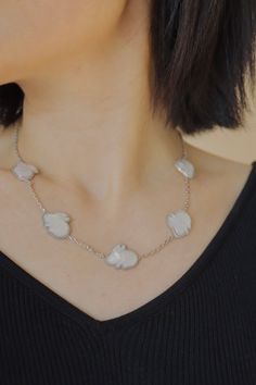 Discover whimsical beauty with our Rabbit Eternity Necklace. Each rabbit, meticulously hand-carved from natural mother of pearl, symbolizes grace and abundance. Set in sterling silver. Embrace the magic and add a touch of elegance to your everyday style.  Measurement: Each Rabbit 18*15mm Length: 45cm/18inch to 40cm/16inch adjustable length. --------------------------------------------------------------------------------------------------- ----- ---------- Custom Work Timeline for gold items. Steps to create your own custom jewelry  (estimated time per step). 1. Discuss your dream design and possibilities and I can give you an estimated quote. (As long as you like)  2. Verify gemstones, gold color, and ring size and get started on a draft. (5-10 days) 3.Adjust the drafting as needed (1-3 da Silver Mother Of Pearl Necklace For Gift, Bunny Owner, Eternity Necklace, Bunny Necklace, Rabbit Charm, Mother Of Pearl Necklace, Necklace Sterling Silver, Cute Jewelry, Columbus