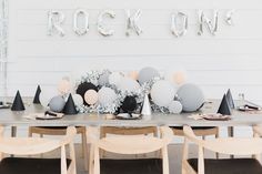 a table with black, white and silver decorations