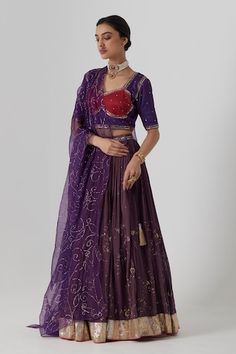 Deep purple tissue chanderi lehenga with all over gullista bloom aari-zardozi embroidered highlights. Paired with a half sleeves embroidered purple-pink choli cut blouse and bloom pattern mukaish organza dupatta. - Aza Fashions Purple Cotton Silk Sets With Traditional Drape, Fitted Cotton Silk Lehenga With Sheer Dupatta, Purple Wedding Dupatta For Transitional Season, Purple Wedding Dupatta, Purple Georgette Lehenga With Gota Work, Purple Cotton Silk Saree Set, Fitted Cotton Silk Lehenga With Gota Work, Wedding Cotton Silk Purple Pre-draped Saree, Designer Purple Choli With Gota Work