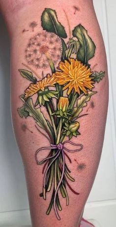 a woman's thigh with flowers and leaves on her leg, painted in watercolor