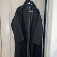 Never Worn Oversized Black Outerwear For Work, Black Long Sleeve Outerwear For Work, Black Long Coat For Spring, Classic Black Spring Outerwear, Black Outerwear For Spring Workwear, Black Fall Outerwear For Work, Black Outerwear For Workwear In Fall, Classic Black Oversized Outerwear, Oversized Black Long Coat Blazer