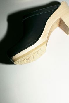 Classic slide on clog in chalk suede, with a high heel base, rounded toe and open back. 3" glossed natural wooden heel with .5" platform in front. Water repellent leather and lacquered wooden base. Made in the USA. Wooden Clogs With Stacked Heel And Round Toe, Wooden Platform Clogs With Round Toe, Classic High Heel Clogs With Leather Sole, Wooden Heel, Slide On, Wooden Base, Sale Design, Custom Items, Repellent