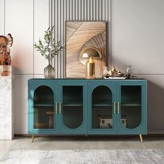 a blue cabinet with glass doors in a living room