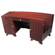 a wooden desk with two drawers on each side