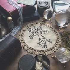 a table topped with lots of different types of items on top of a wooden table