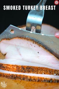 someone using a knife to cut meat on a cutting board with the words smoked turkey breast