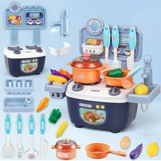 an assortment of kitchen toys including pots, pans and utensils